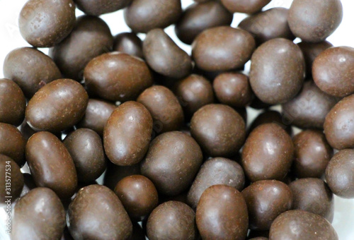 Chocolate peanuts. Nuts. Dessert. Brown color. Cocoa.