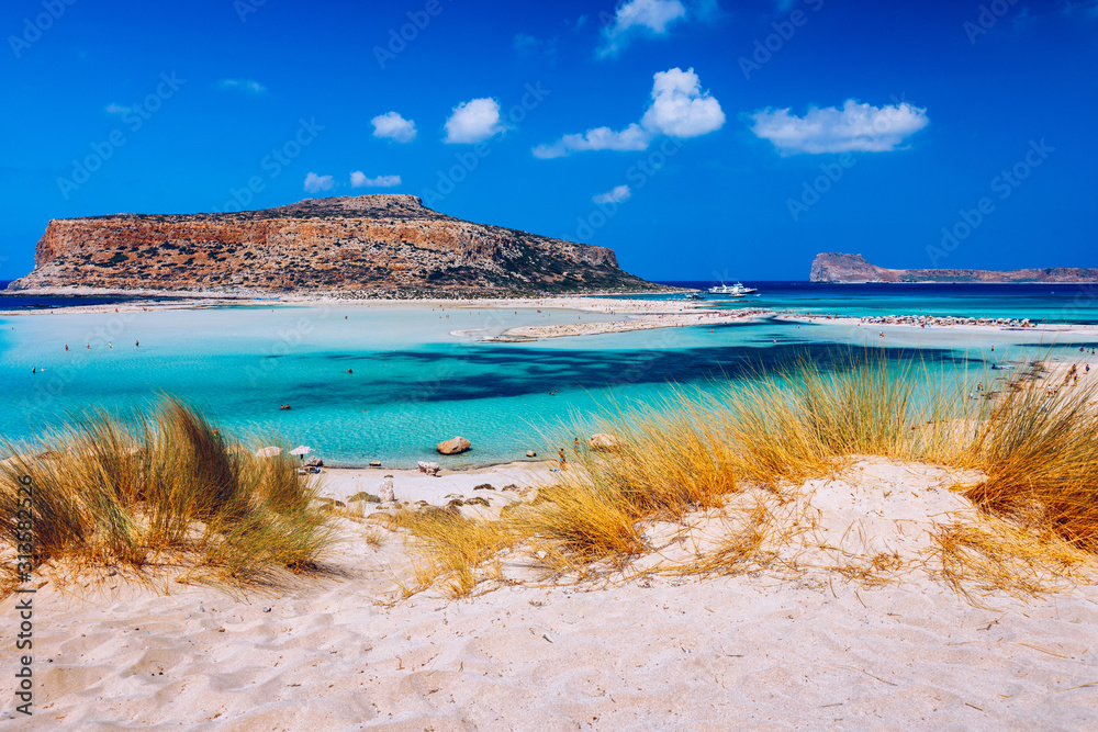 Amazing beach with turquoise water at Balos Lagoon and Gramvousa in Crete, Greece. Cap tigani in the center. Balos beach on Crete island, Greece. Landscape of Balos beach at Crete island in Greece.