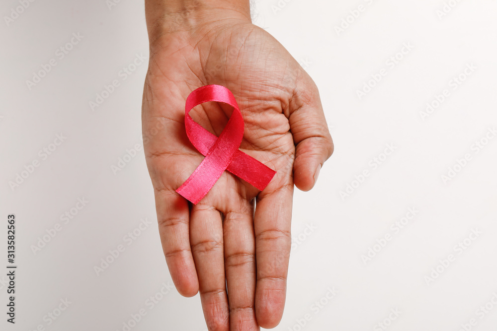 Pink ribbon for breast cancer awareness, symbolic bow color raising awareness on people living with women's breast tumor illness Pink ribbon for breast cancer awareness, symbolic bow color raising awareness on people living with women's breast tumor illness