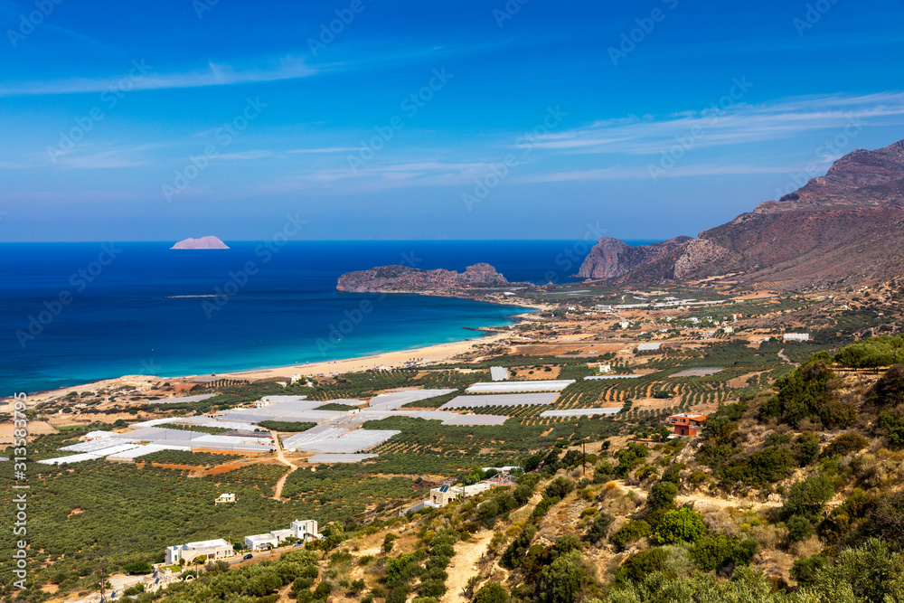 Shot of beautiful turquoise beach Falasarna (Falassarna) in Crete, Greece. View of famous paradise sandy deep turquoise beach of Falasarna (Phalasarna) in North West, Crete island, Greece.