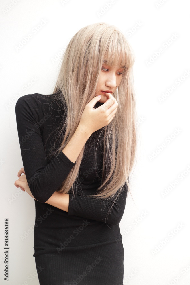 Beautiful girl makes herself the makeup, isolated Beautiful Asian models over background for advertising concept Beautiful girl makes herself the makeup, isolated Beautiful Asian models over background for advertising concept