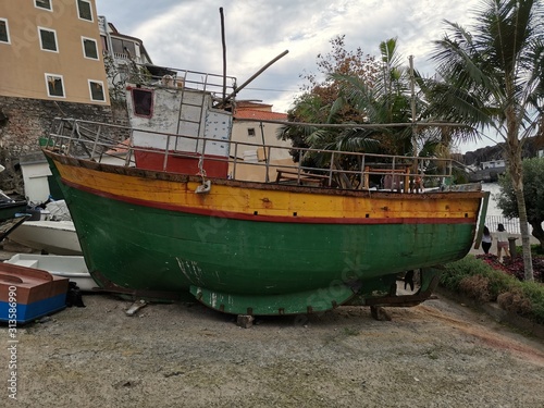 Wallpaper Mural View of fishing boat in Camara de Lobos town in south of Madeira island, Portugal Torontodigital.ca