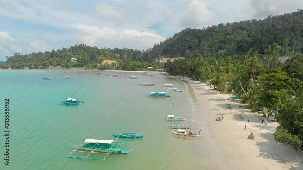 Aerial drone view of Port Barton Beach on paradise island, tropical travel destination - Port Barton, San Vicente, Palawan, Philippines. Aerial drone view of Port Barton Beach on paradise island, tropical travel destination - Port Barton, San Vicente, Palawan, Philippines.