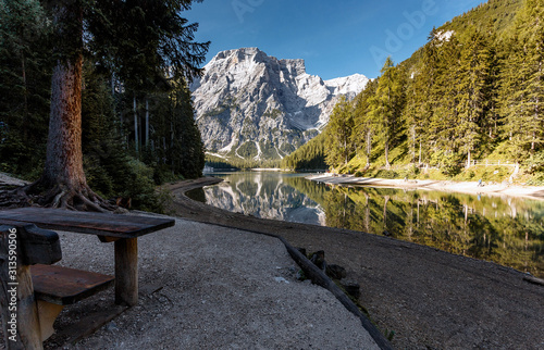 Incredible Nature landscape. Famous alpine place of the world Amazing Braies Lake with Seekofel mount on background. Awesome nature Scenery. Popular plase for photographers. Beautiful in the World photo