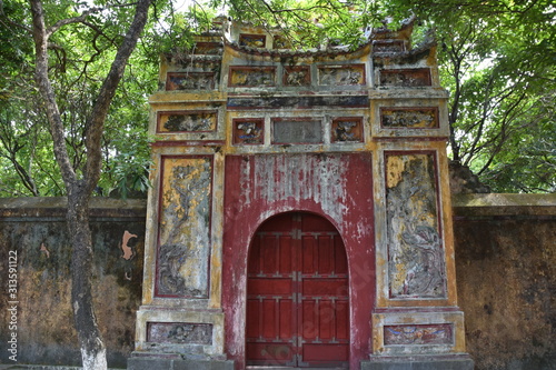 Weathered Red and Yellow Vietnamese-Style Gate, Hue Citadel, Vietnam