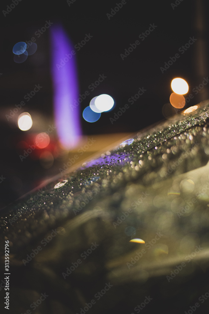 winter image of water drops on car windshield 