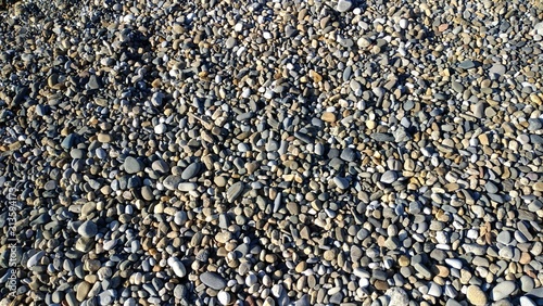 seashore with a beautiful gray stones