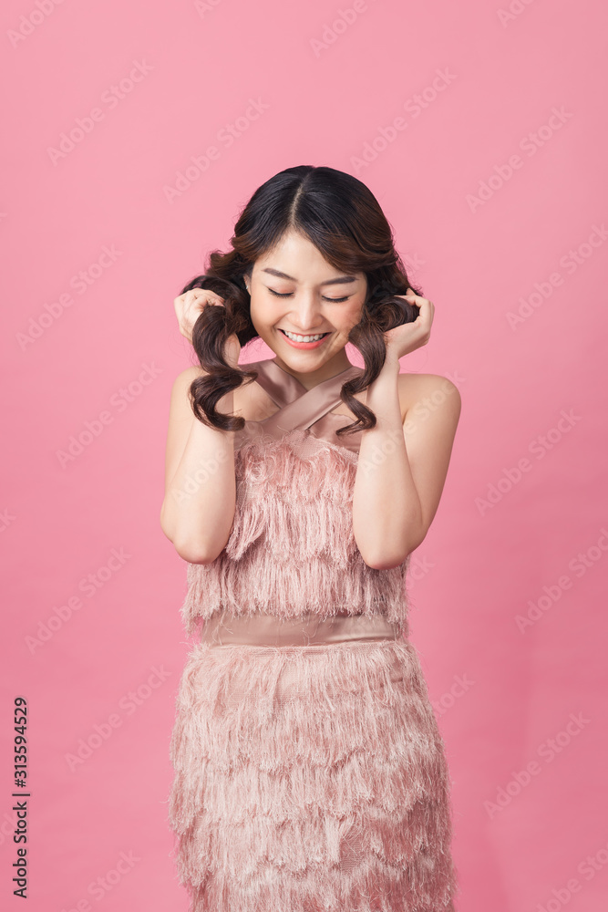 Portrait of smiling woman at studio shot