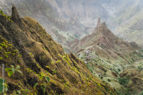 Mountain peaks in Xo-Xo valley of Santa Antao island at Cape Verde. Arid and erosion mountain peaks and local village in the valley
