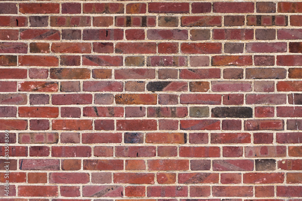 Purple brickwall background or texture close up Purple brickwall background or texture close up