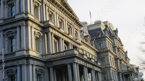 an image at evening of hte dwight d eisenhouer executive office buildings which functions as extra office buildings for the white house.
