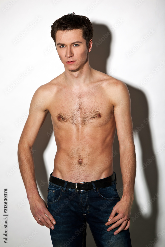 Attractive guy posing on white background