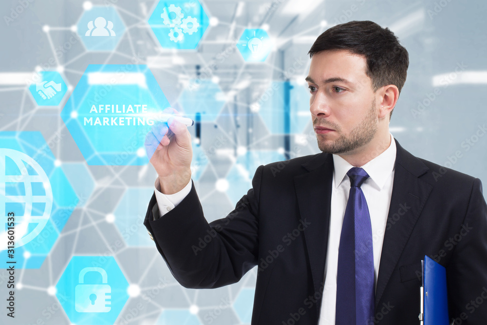 Obraz premium Business, Technology, Internet and network concept. Young businessman working on a virtual screen of the future and sees the inscription: Affiliate marketing