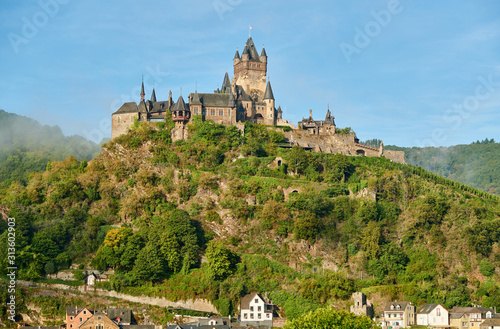Leinwand Poster Beautiful Reichsburg castle on a hill in Cochem, Germany