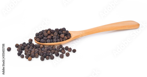 black pepper , spoon on white background