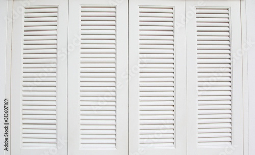 Window on wooden white house wood background