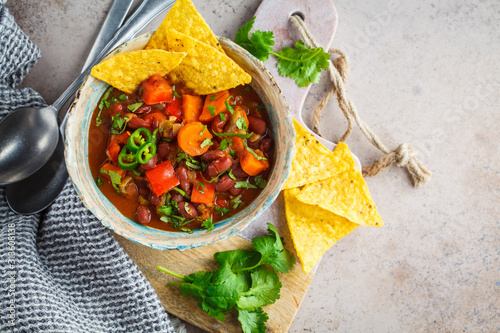 Mexican bean soup with nachos. Healthy vegan food concept.