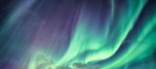Leinwandbilder Nordlichter Aurora Borealis mit funkelnden Sternen  © Mumemories