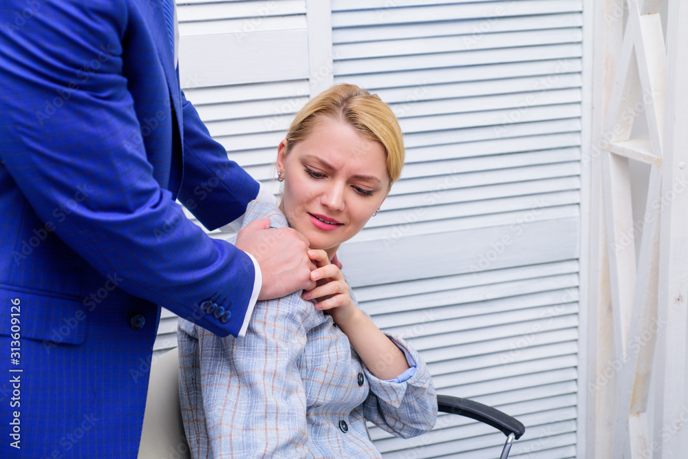 Fototapeta premium Defend yourself. First signs. Unacceptable touches. Discrimination abuse complaint. Victim sexual abuse at workplace. Abuse targeted at employee. Male coworker touching girl. Share assault story.