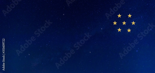 Panorama blue night sky milky way and star on dark background.Universe nebula and galaxy with noise and grain.Photo by long exposure and select white balance.selection focus.golden star.