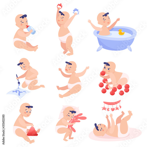 Baby boy set. Beautiful baby in diaper playing with different toys