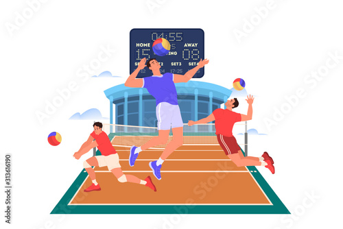 Volleyball player jumping and hitting a ball