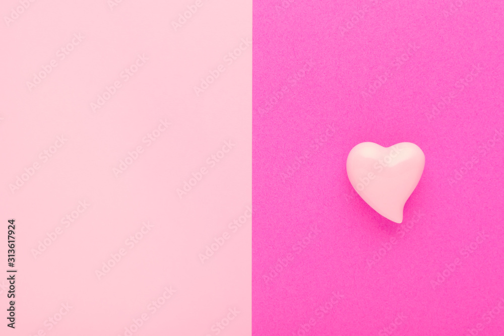 pink background with a heart and copy space