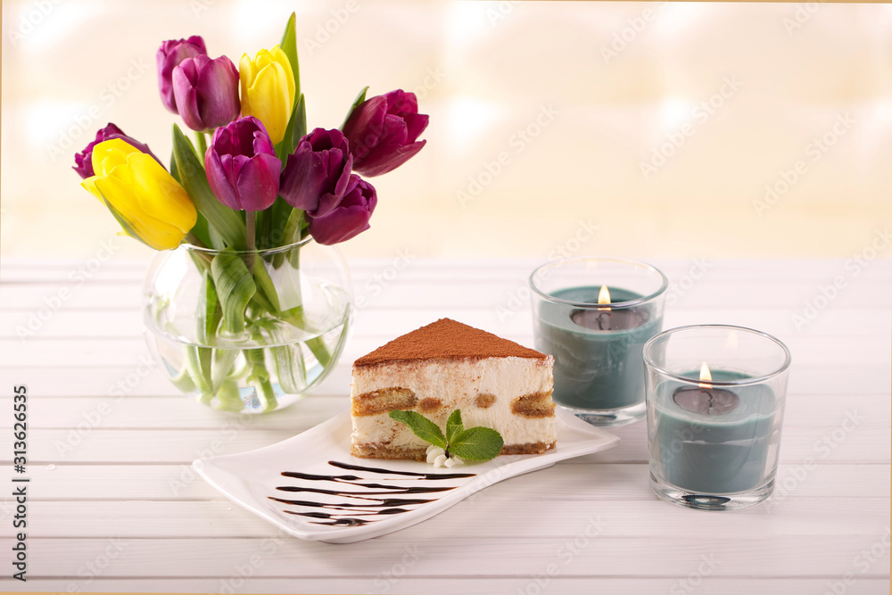  Delicious tiramisu cake and tulip flowers as a gift for March 8