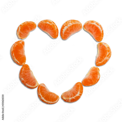 heart made of tangerine cloves, top view