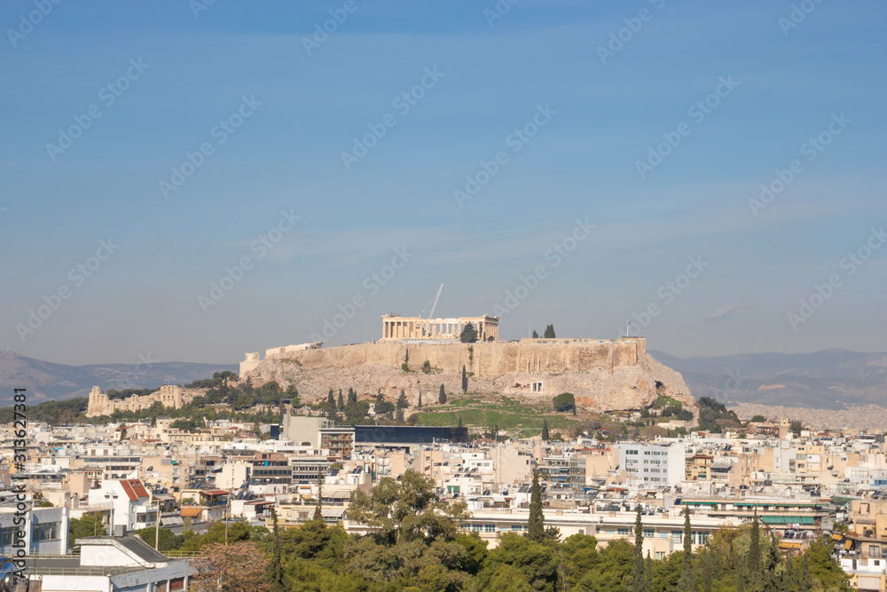 Rooftop view of acropolis on a sunny day in athens, greece