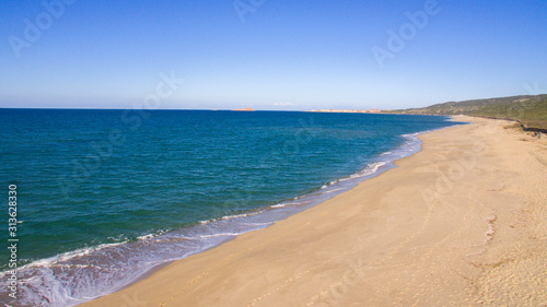 Wallpaper Mural beautiful aerial panorama with the drone of the famous beaches at the Sardinian sea with the isola rossa and castelsardo behind Torontodigital.ca
