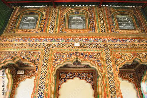 Facade of an old mansion with a painting in the city of Sikar, Rajasthan, India