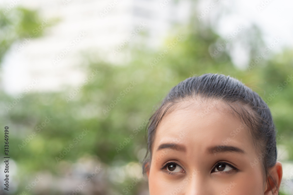 stressed upset thoughtful asian woman thinking, looking up; portrait of asian woman looking up, thinking, finding good idea or decisive plan; adult southeast asian woman model stressed upset thoughtful asian woman thinking, looking up; portrait of asian woman looking up, thinking, finding good idea or decisive plan; adult southeast asian woman model