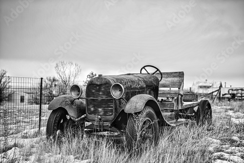 Vintage truck abandoned in a field.