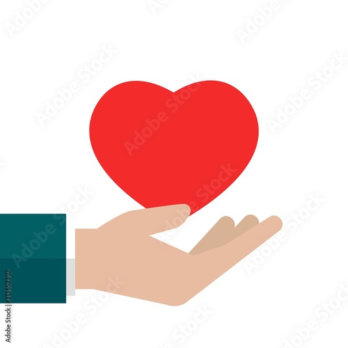 Hand holding red heart on white background. charity, philanthropy, giving help