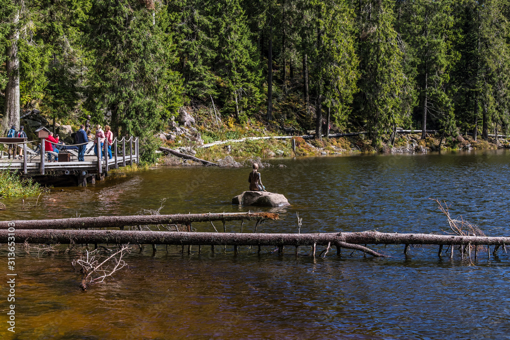 Germany, Baden-Württemberg, Baden-Baden: scenic view over the Mummelsee in the Black Forest, sculpture of a mermaid girl Germany, Baden-Württemberg, Baden-Baden: scenic view over the Mummelsee in the Black Forest, sculpture of a mermaid girl