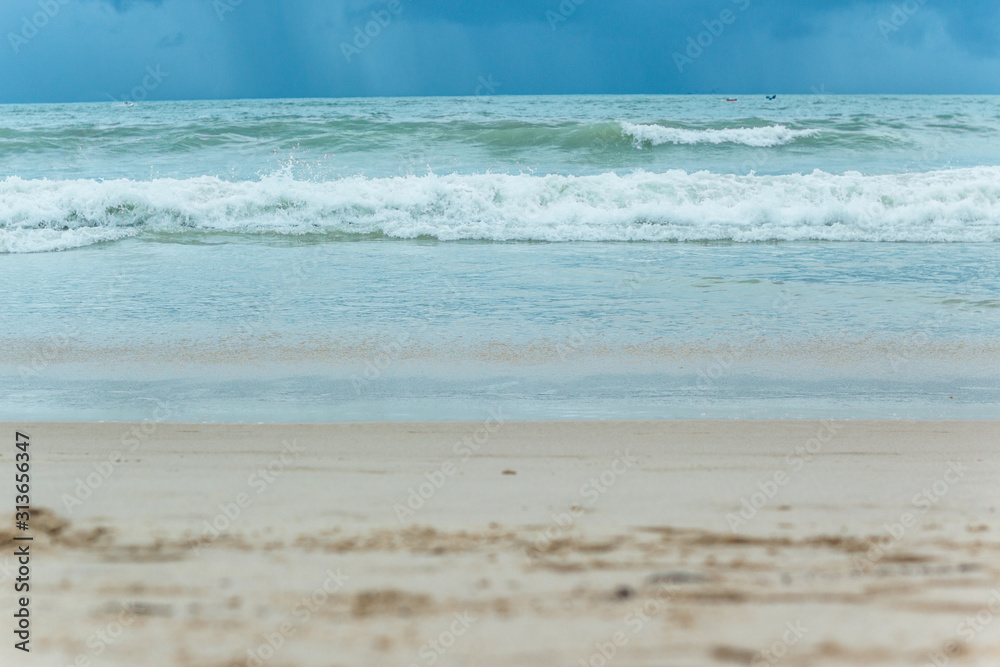 Sea Beach and Soft wave of blue ocean. beautiful summer background with sandy beach