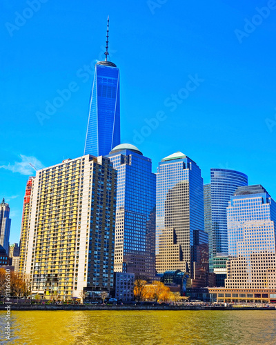 Skyline with Skyscrapers in Financial Center at Lower Manhattan, New York City, America. USA. American architecture building. Panorama of Metropolis NYC. Metropolitan Cityscape