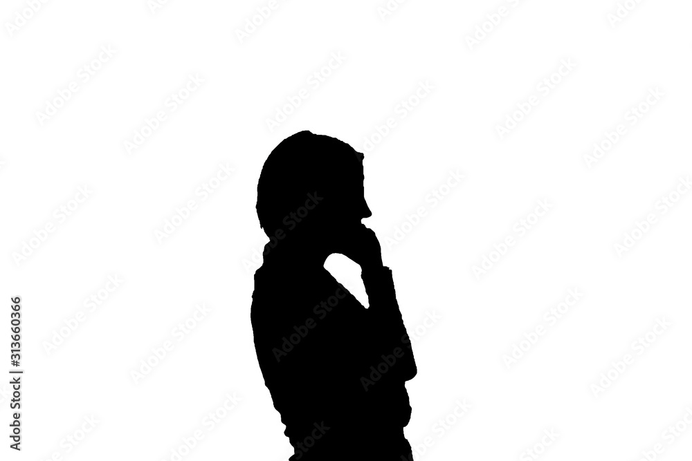 Silhouette of person talking on a cell phone