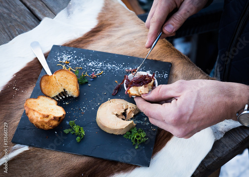 Close up of man having food outdoors