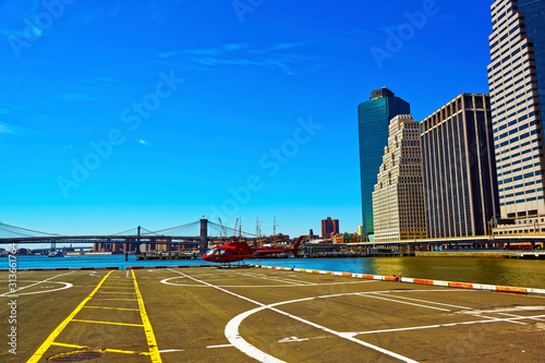 Quadro em tela Helicopter landing at helipad