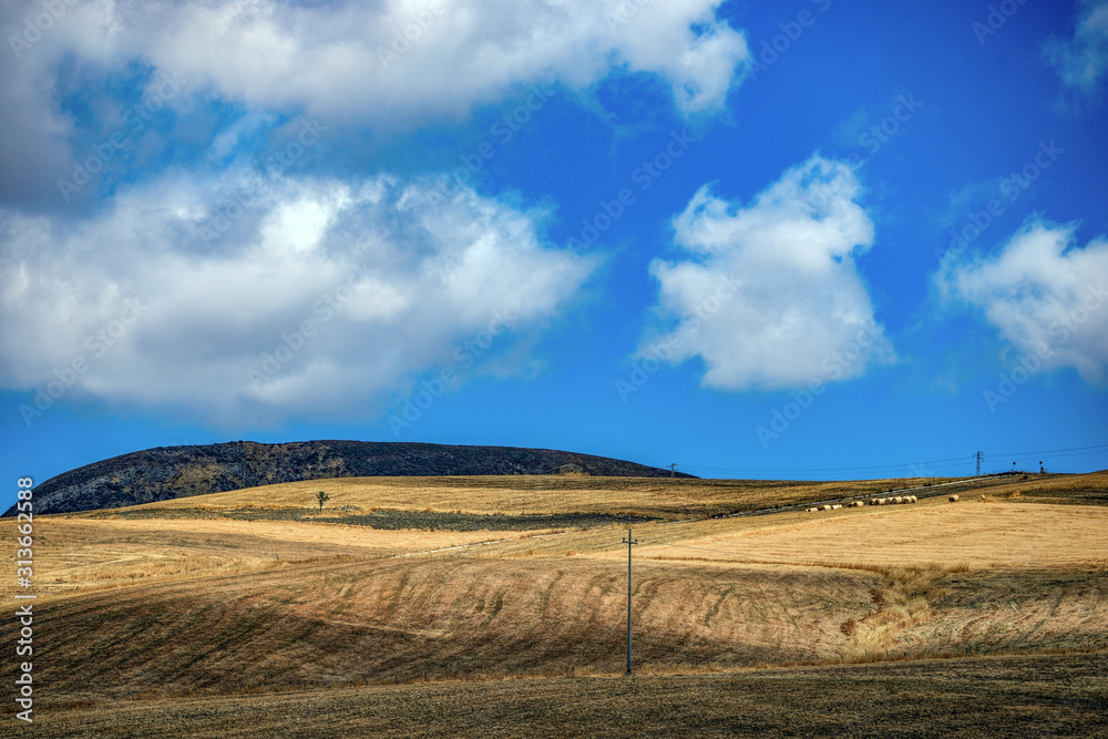 field and blue sky, countryside, small town, village, sicily, italy, italien,summer, vacation field and blue sky, countryside, small town, village, sicily, italy, italien,summer, vacation