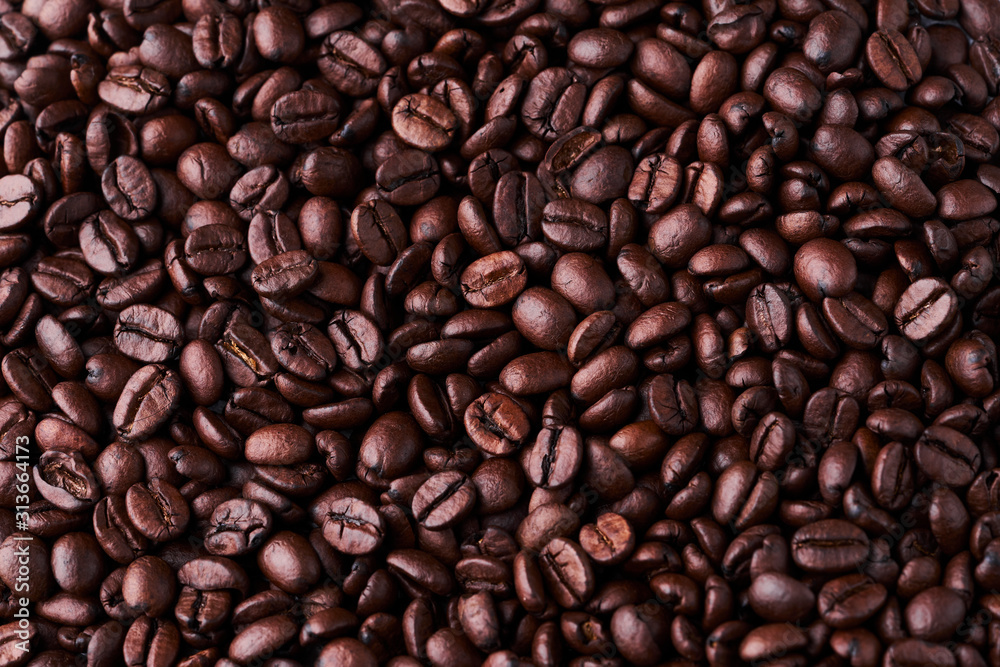 Roasted coffee beans background, top view. Copy space Roasted coffee beans background, top view. Copy space