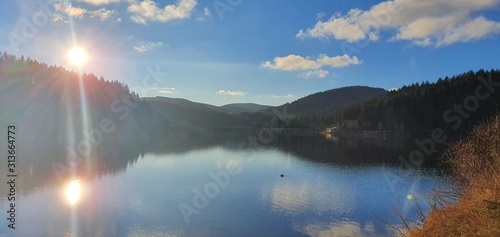 lake sunset sunny forest blue sky mountain