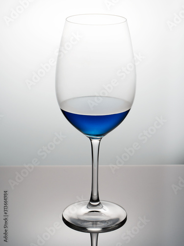 glass of  blue wine