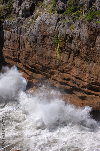 Blowholes and waves. Paparoa National Park. Punakaiki. Pancake Rocks. Westcoast New Zealand. Rocks. Ocean