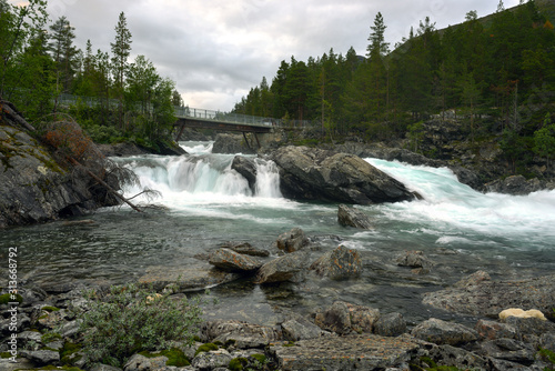 waterfall in the forest  norway  countryside  norge