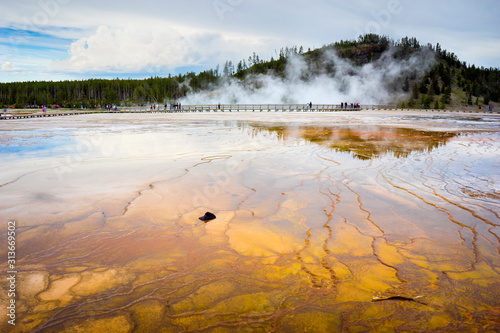 A hat sits in the colorful run-off channels of Grand Prismatic Spring photo