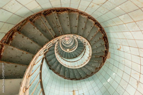spiral staircase leading to a lighthouse