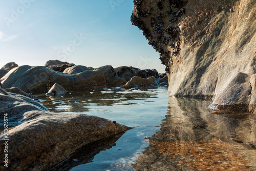 Reflecting Rocks in the Sea near Porto Portugal Praia